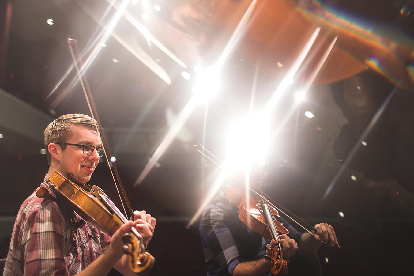 student playing violin