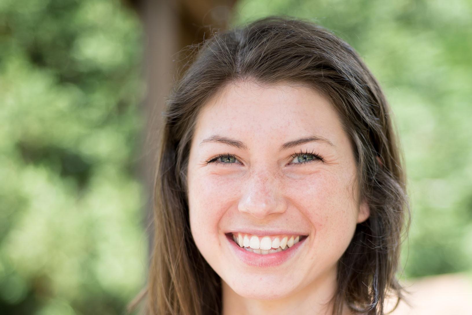 Sarah Eskildson poses for photo outside of Woodward Library