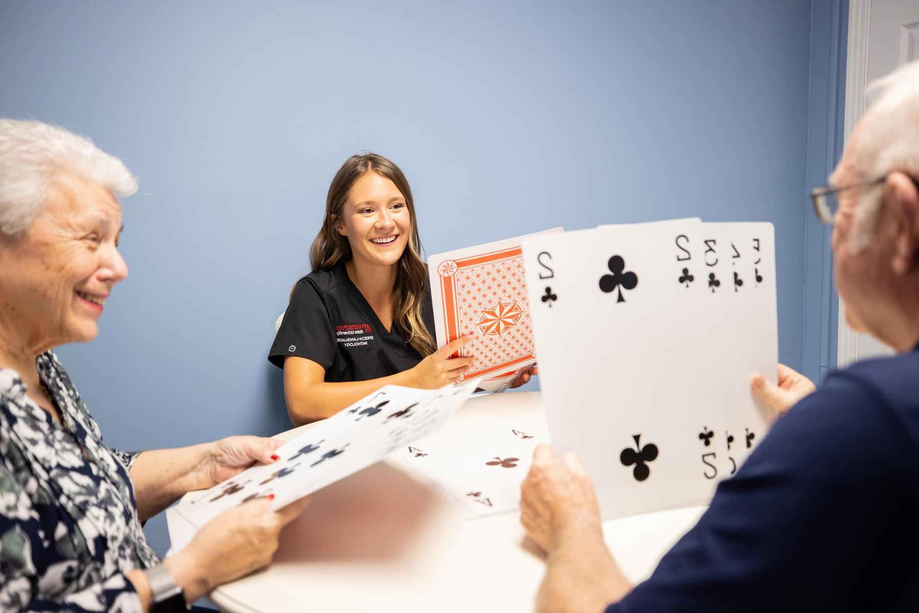 365bet graduate student Grace Moore works with patients in the Speech-Language & Swallowing Community Clinic.