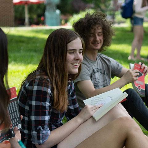 Students reading next to AP bowl